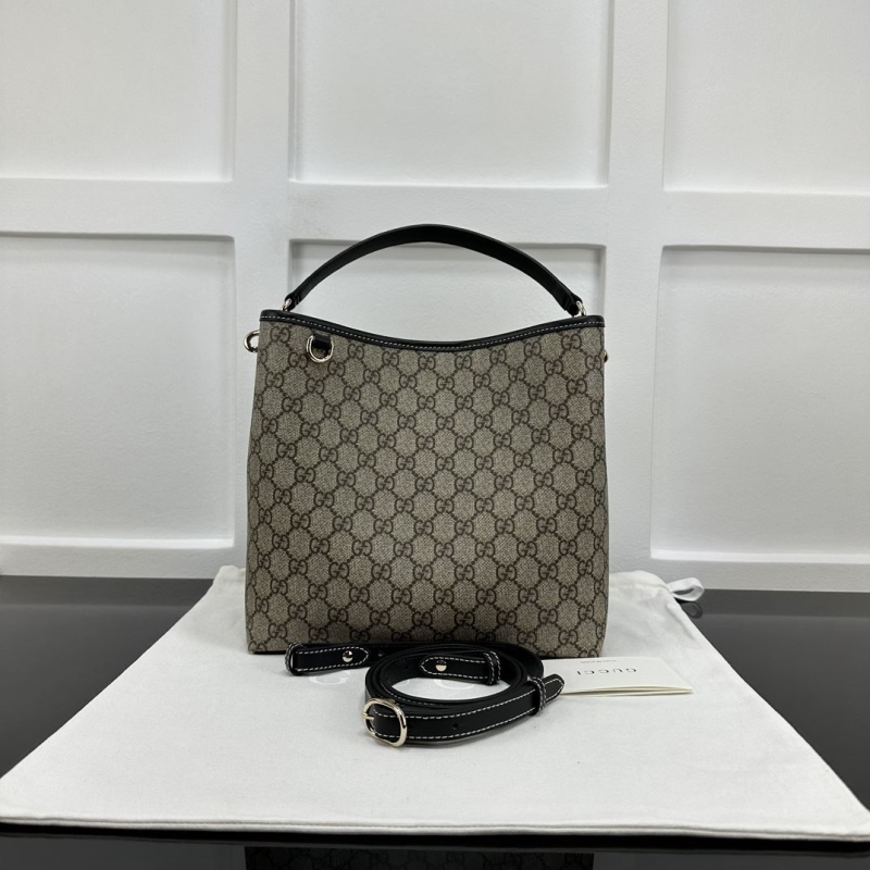 G*u*i top handle bags